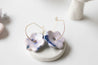 Erbium porcelain flower pendant earrings