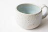 Cappuccino mug in Icy Blue on Speckled Clay
