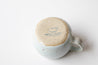 Cappuccino mug in Icy Blue on Speckled Clay