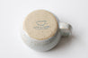 Cappuccino mug Nr.2 in Icy Blue on Speckled Clay