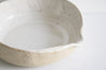 Handmade white speckled ceramic bowl by Mesh & Cloth