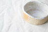 Handmade white speckled ceramic bowl by Mesh & Cloth