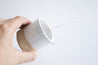 Handmade white speckled ceramic pitcher by Mesh & Cloth