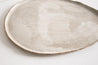 Handmade grey drop ceramic plate by Elisabetta Lombardo