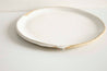 Handmade white speckled ceramic plate by Mesh & Cloth