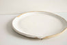 Handmade white speckled ceramic plate by Mesh & Cloth