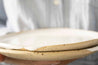 Handmade white speckled ceramic plates by Mesh & Cloth