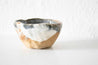 Rustic bowl with red and white glaze by Mesh & Cloth