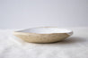 Handmade white speckled ceramic bowl by Mesh & Cloth