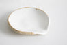 Handmade white speckled ceramic spoon rest by Mesh & Cloth