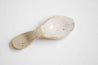 White ceramic spoon